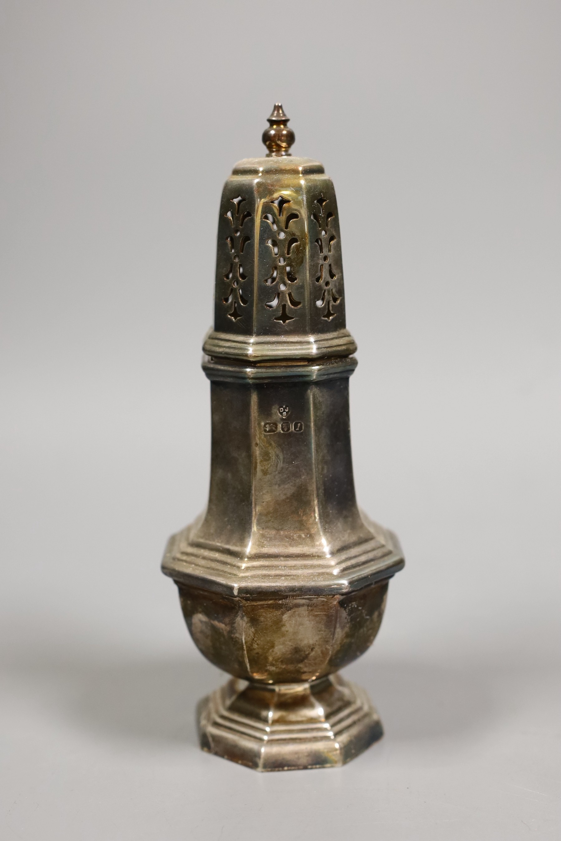 A George VI silver octagonal baluster caster, 5.4oz